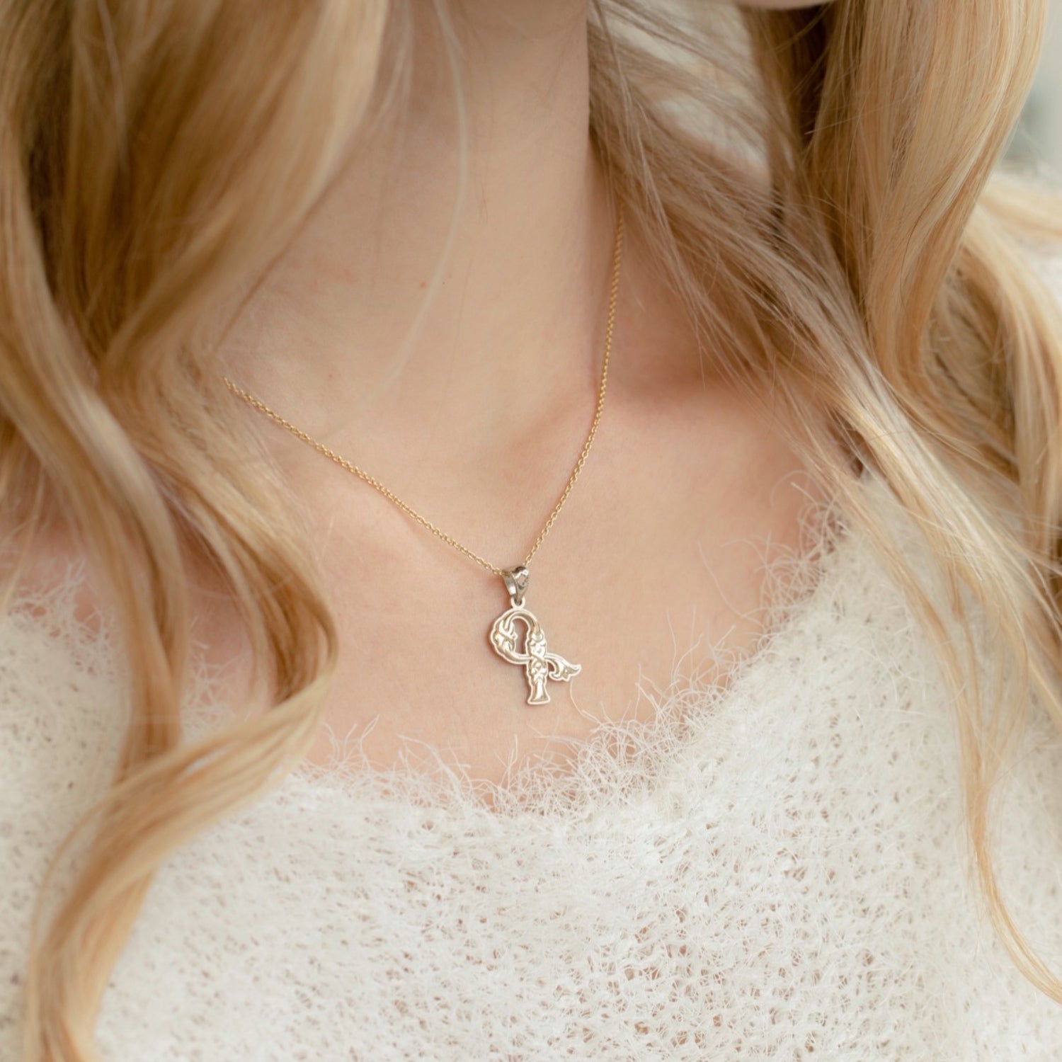 Armenian Initial Two-Tone Gold Pendant on a Model