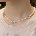 Diamond Pavé Three Step Motif Pearl Necklace on a Model