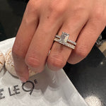 Emerald Cut Lab-Grown Diamond Hidden Halo Engagement Ring on a Model