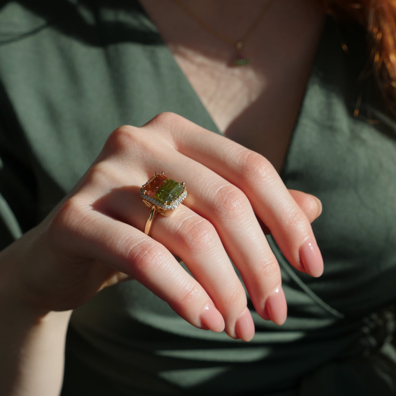 Emerald Cut Watermelon Tourmaline Diamond Halo Ring on a Model