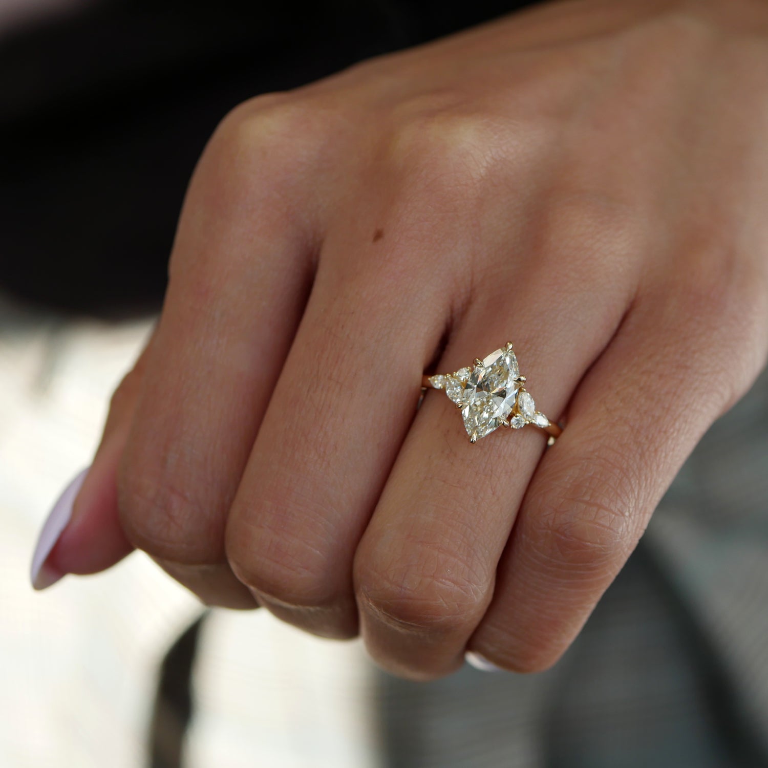 Marquise Cut Lab-Grown Diamond Cluster Floral Engagement Ring on a Hand