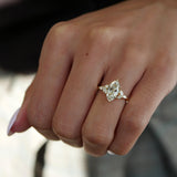 Marquise Cut Lab-Grown Diamond Cluster Floral Engagement Ring on a Hand