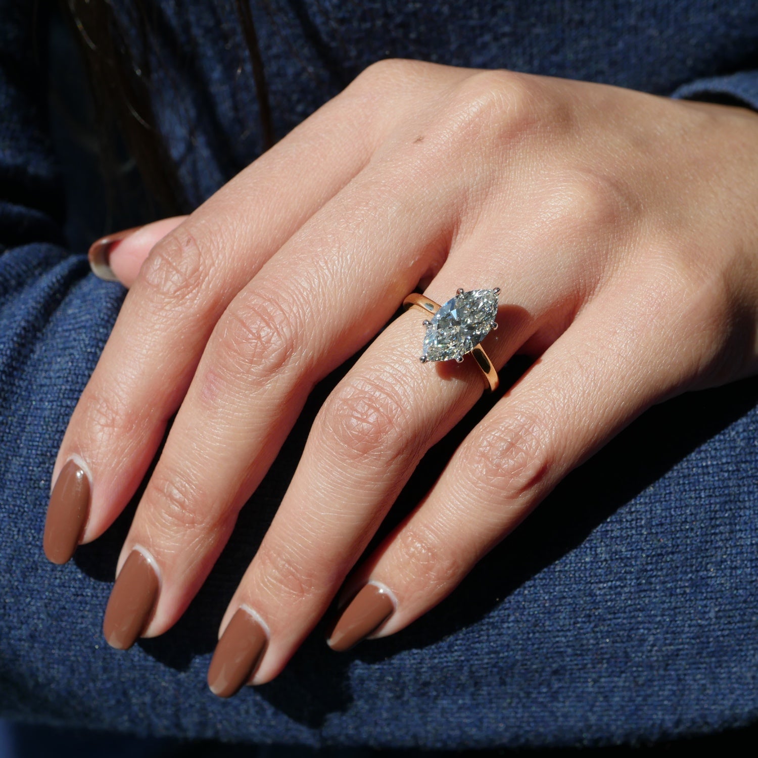 Marquise Cut Lab-Grown Diamond Hidden Halo Solitaire Engagement Ring on a Model
