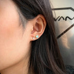 Mermaid Oval Opal Mini Stud Earrings on a Model