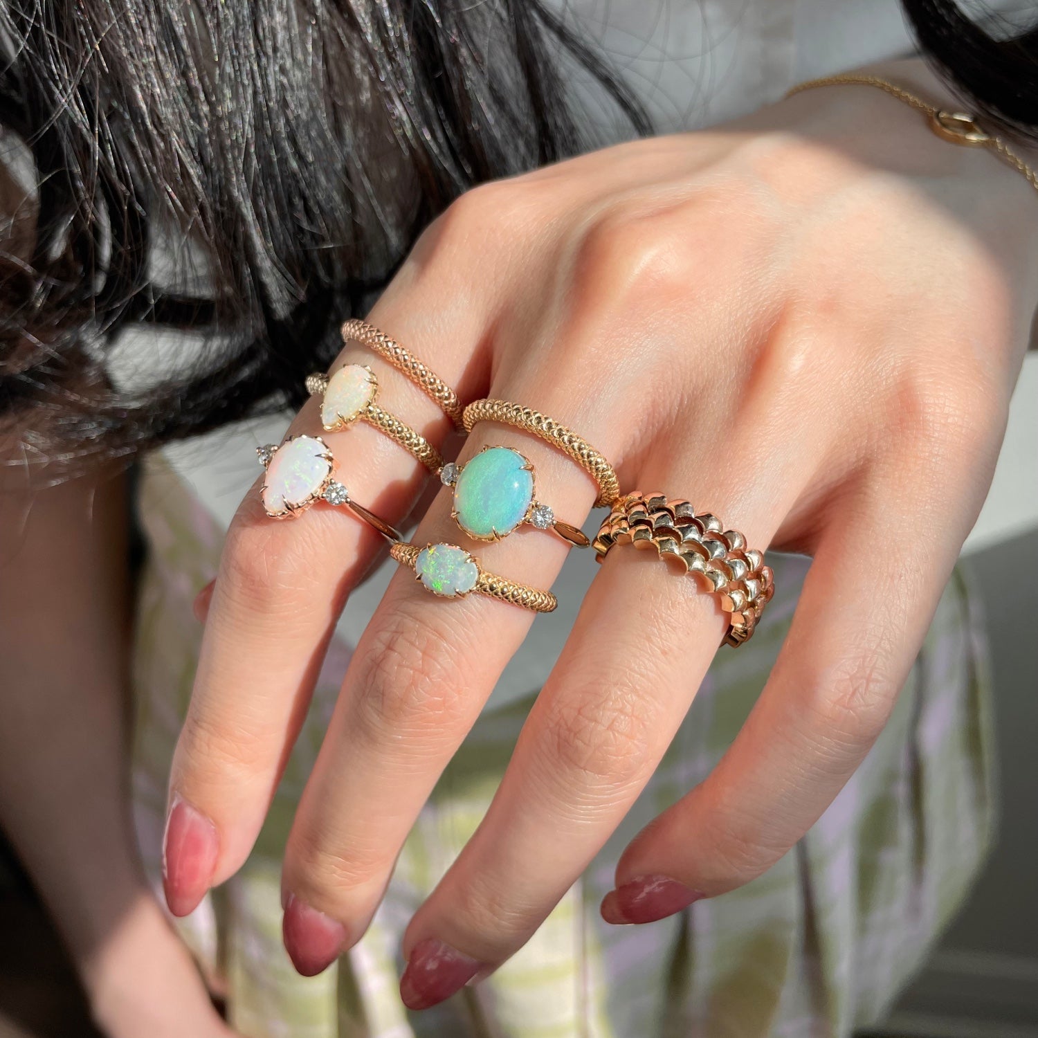 Mermaid Pear-Shaped Opal Ring on a Model