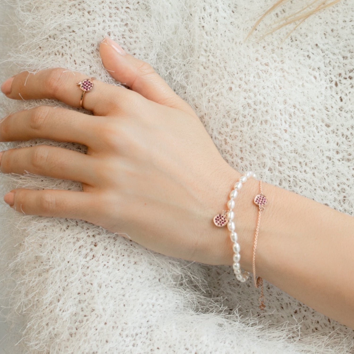 Mini Pomegranate Ruby Pavé Motif Bracelet on a Hand