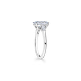 Oval and Baguette Cut Diamond Three-Stone Engagement Ring in White Gold Side View