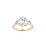 Oval and Heart-Shaped Diamond Three-Stone Engagement Ring in Rose Gold