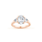 Oval and Heart-Shaped Diamond Three-Stone Engagement Ring in Rose Gold