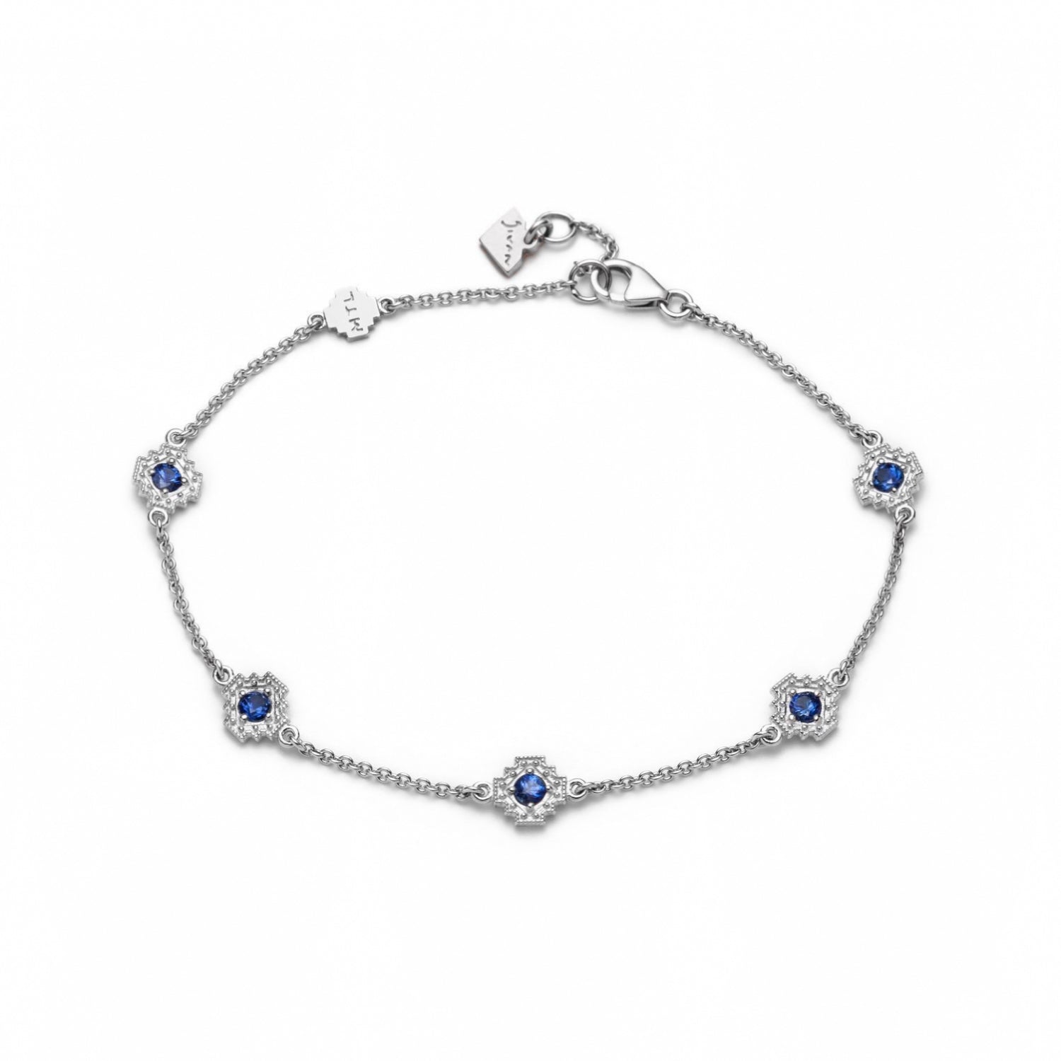 Round Blue Sapphire Five Mini Step Motif Bracelet in White Gold
