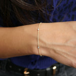 Round Brilliant Cut Diamond Bezel Station Bracelet on a Model