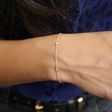 Round Brilliant Cut Diamond Bezel Station Bracelet on a Model