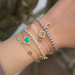 Step Motif Charm Beaded Bracelet on a Hand