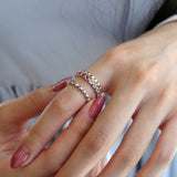 Mermaid Blue Topaz and Amethyst Eternity Ring on a Hand