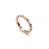 Alternating Round Brilliant Cut Diamond and Sapphire Eternity Ring in Rose Gold Side View