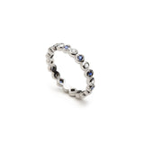 Alternating Round Brilliant Cut Diamond and Sapphire Eternity Ring in White Gold Side View