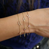 Armenian Letter and Pomegranate Ruby Motif Bracelet on a Model