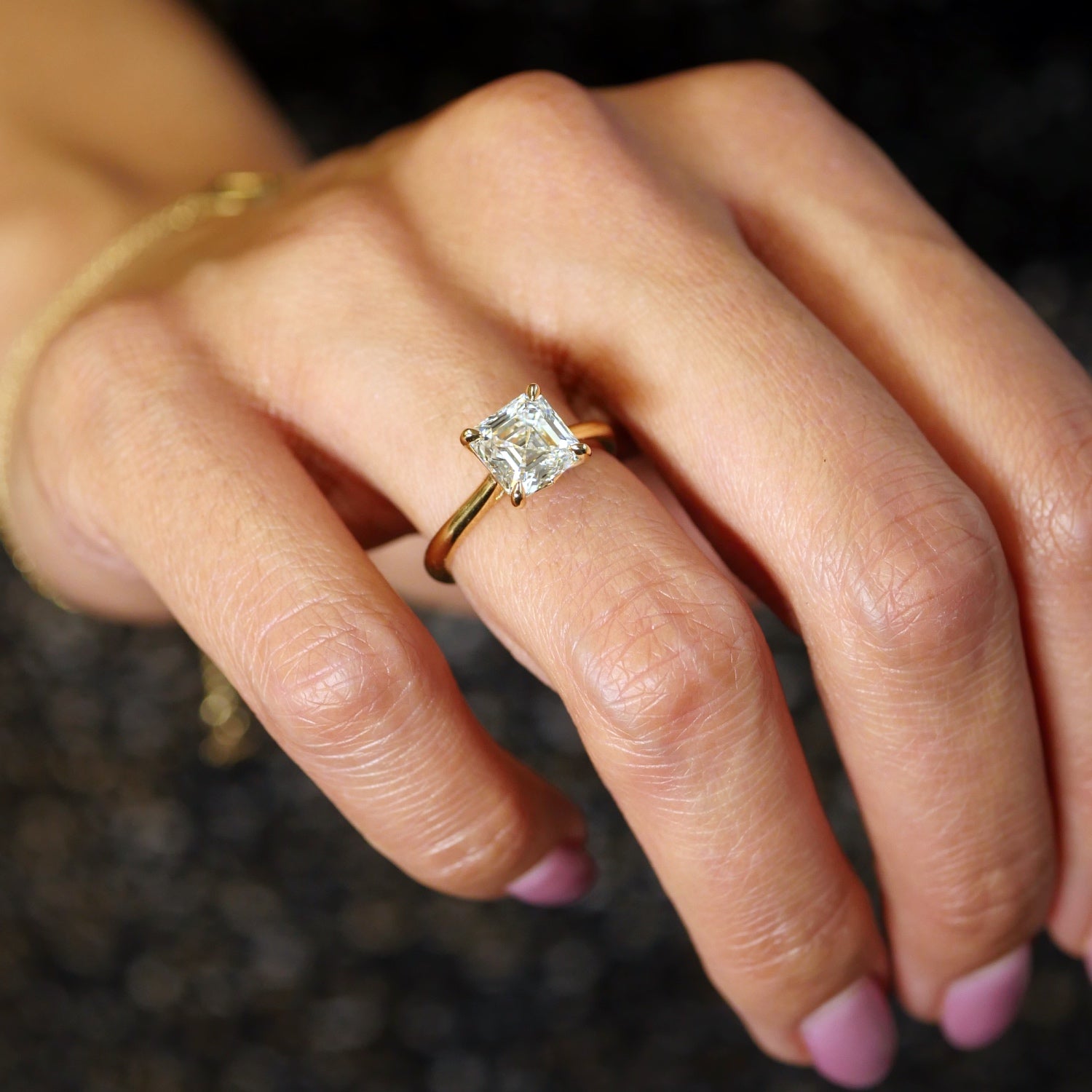 Asscher Cut Lab-Grown Diamond Solitaire Engagement Ring on a Model