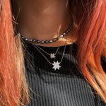 Asteri Diamond Pavé Mini Star Necklace on a Model