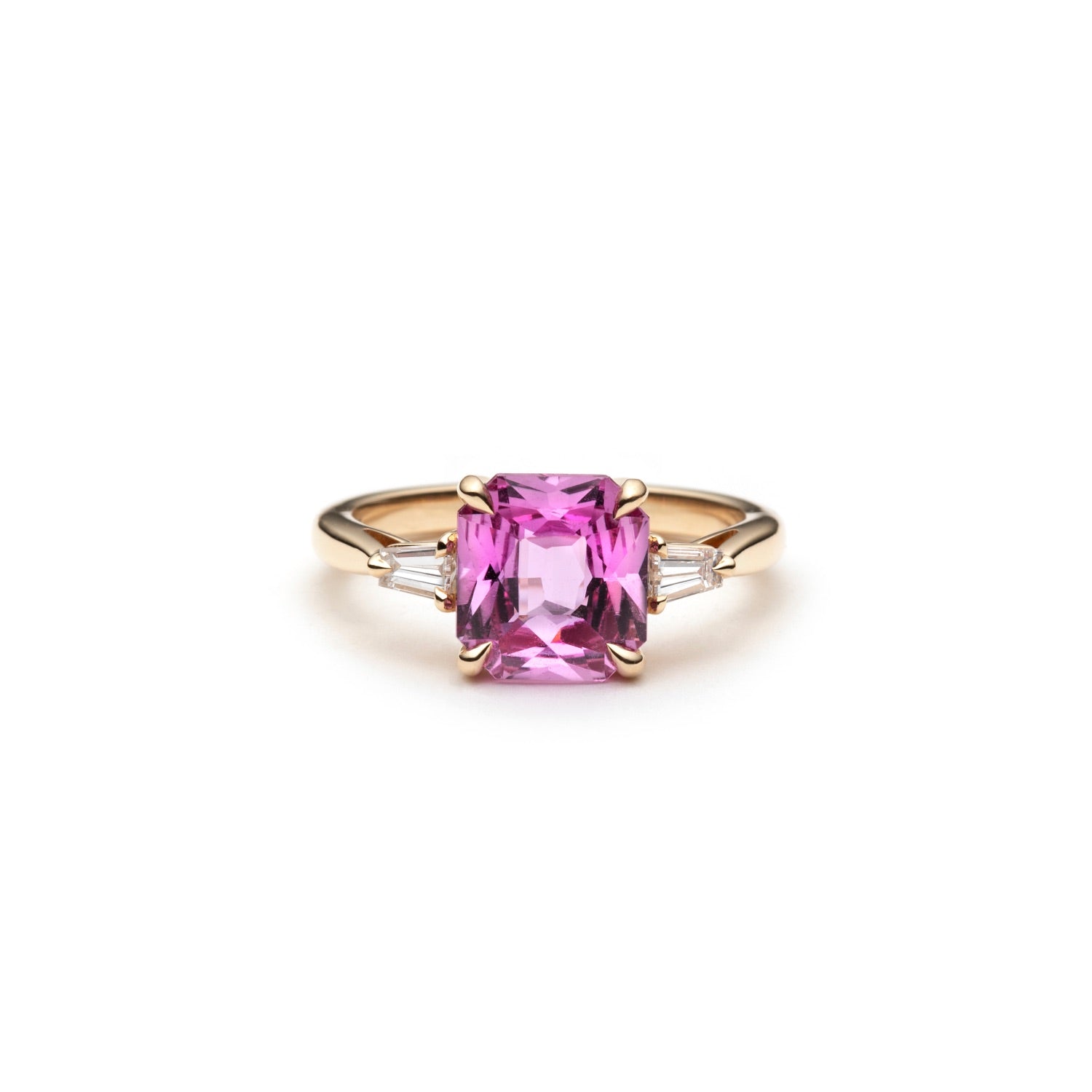 Cut Corner Square Scissor Cut Pink Sapphire and Tapered Baguette Diamond Three-Stone Ring