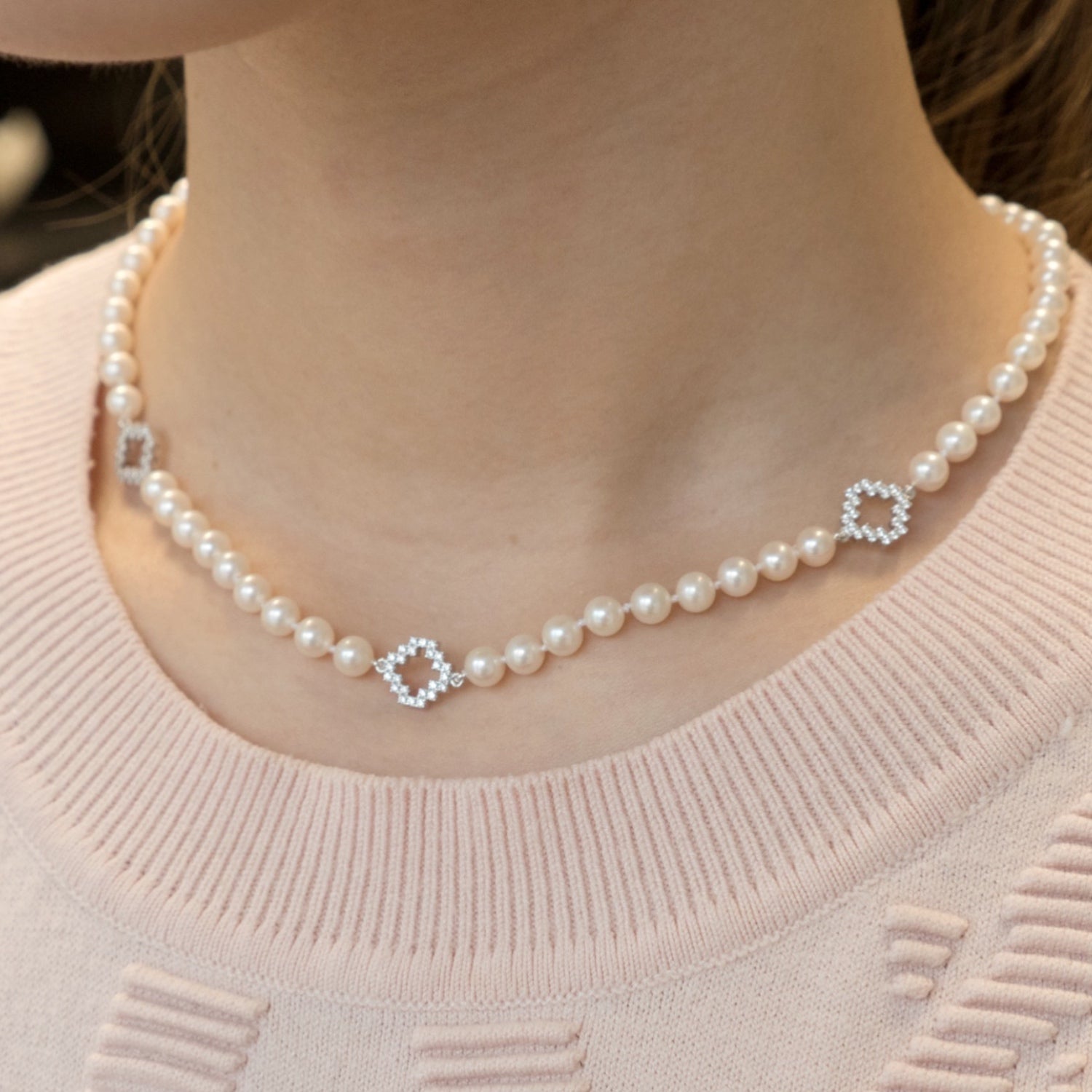 Diamond Pavé Three Step Motif Pearl Necklace on a Model
