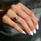 Elongated Cushion Cut Lab-Grown Diamond Hidden Halo Engagement Ring on a Model