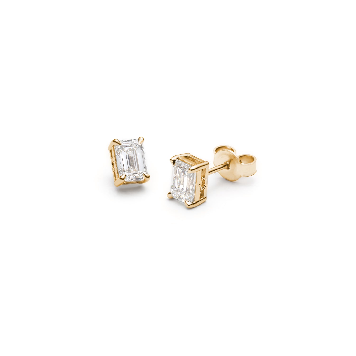 Emerald Cut Diamond Four-Prong Basket Stud Earrings in Yellow Gold