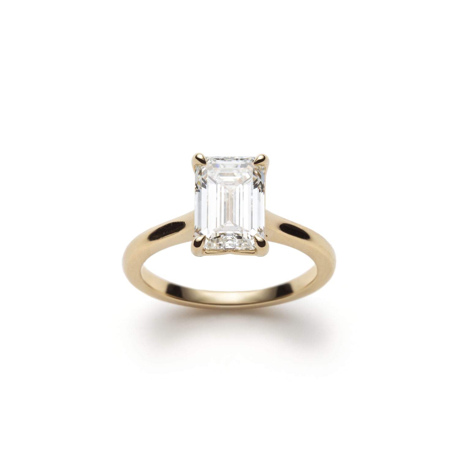 Emerald Cut Diamond Solitaire Engagement Ring in Yellow Gold Front View