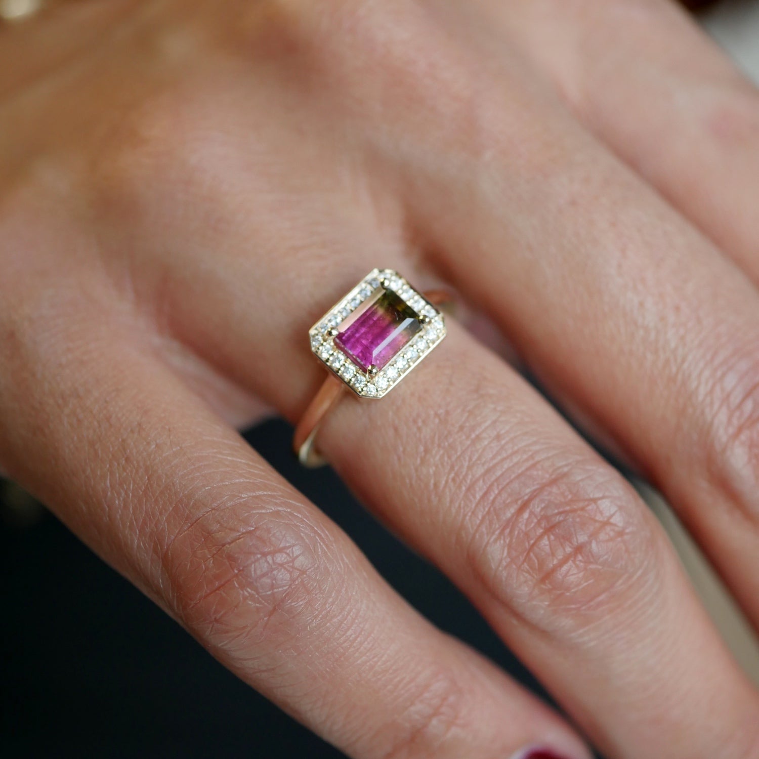 Emerald Cut Watermelon Tourmaline Diamond Halo East-West Ring on a Model