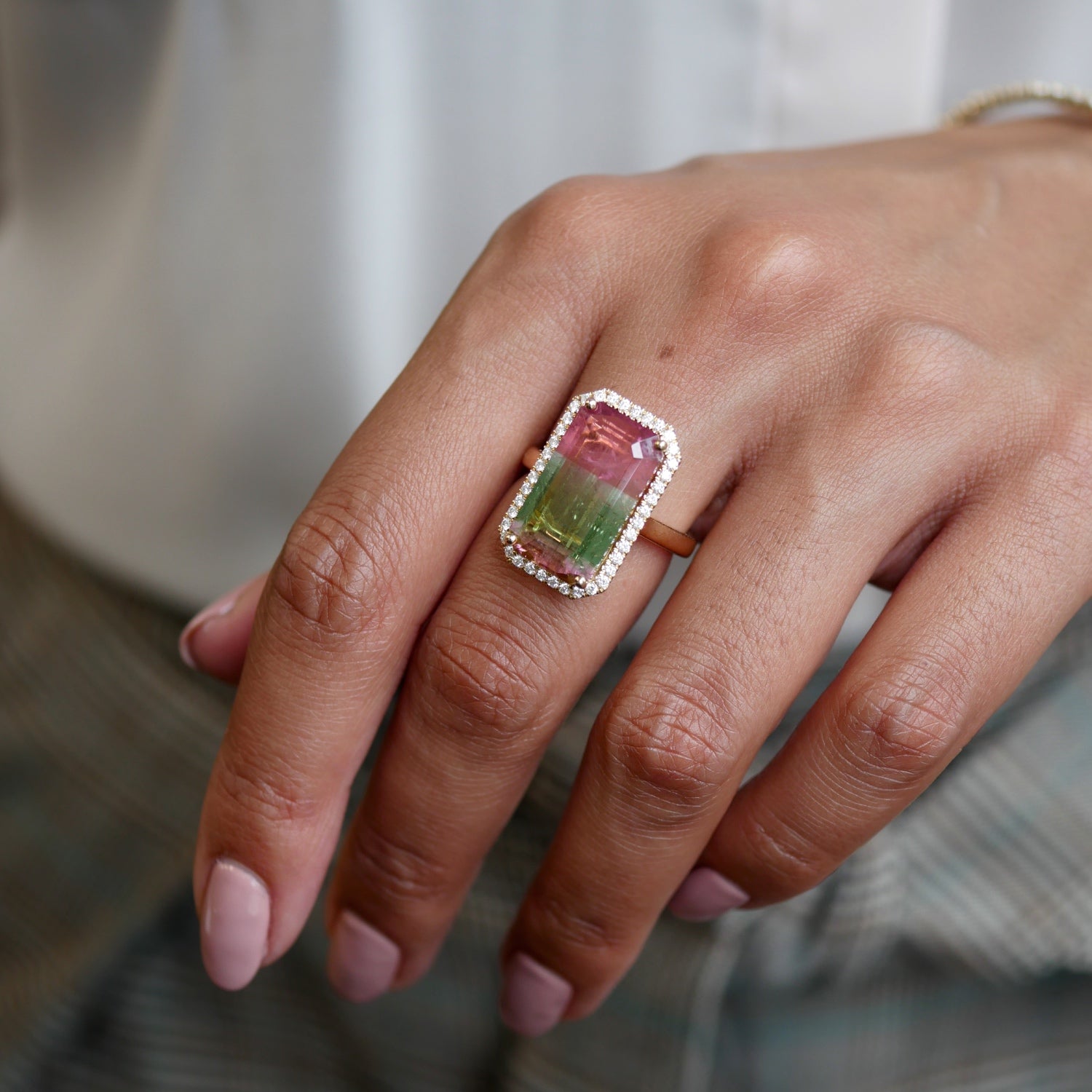 Emerald Cut Watermelon Tourmaline Diamond Halo Cocktail Ring on a Hand