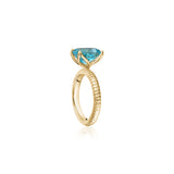 Lepia Cushion Swiss Blue Topaz Ring in Yellow Gold Side View
