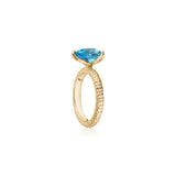 Lepia Pear-Shaped Swiss Blue Topaz Ring in Yellow Gold Side View
