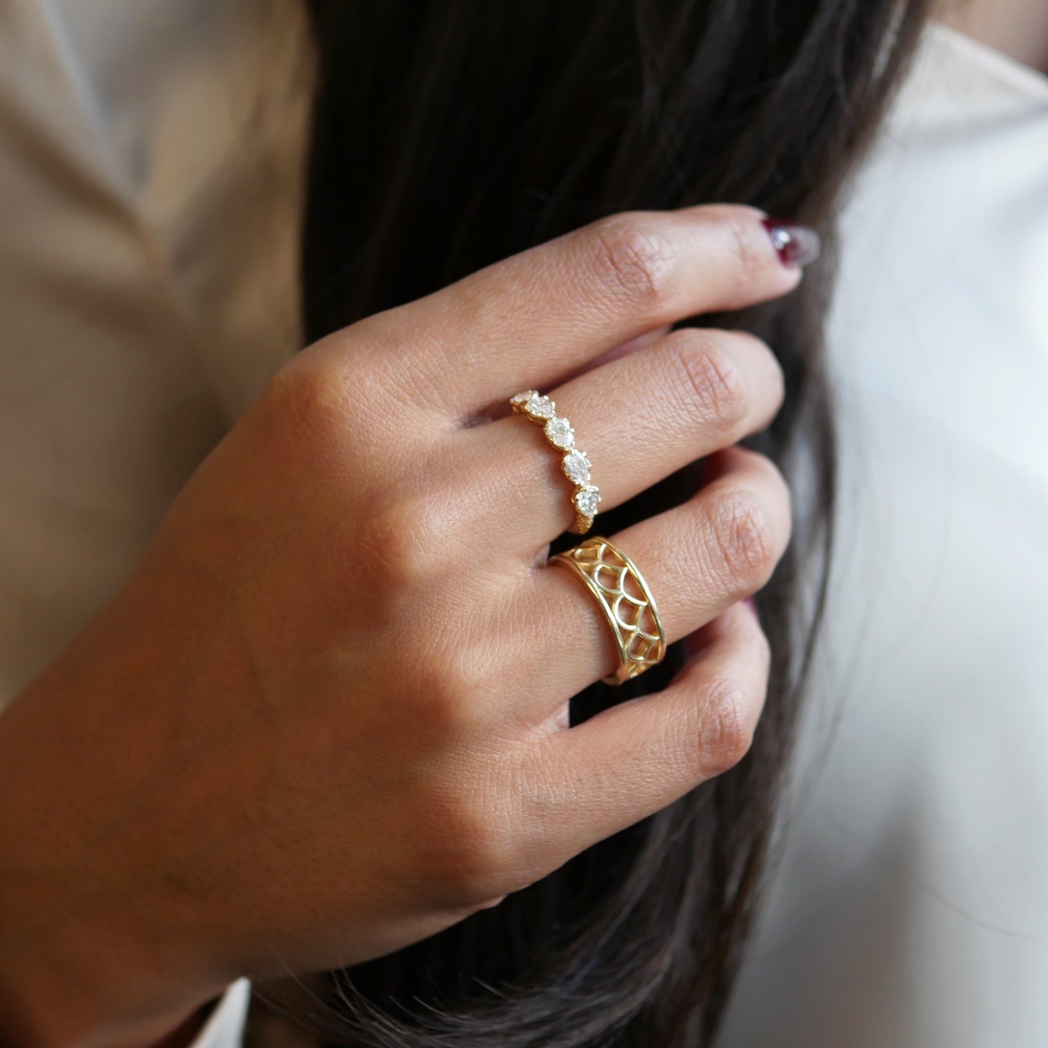 Lepia Pear-Shaped Diamond Five-Stone Ring on a Model