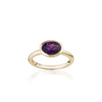 Mermaid Oval-Shaped Violet Sapphire East-West Bezel Ring in Yellow Gold
