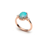 Mermaid Oval Opal and Diamond Three-Stone Ring in Rose Gold Side View