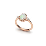 Mermaid Pear-Shaped Opal and Diamond Three-Stone Ring in Rose Gold Side View