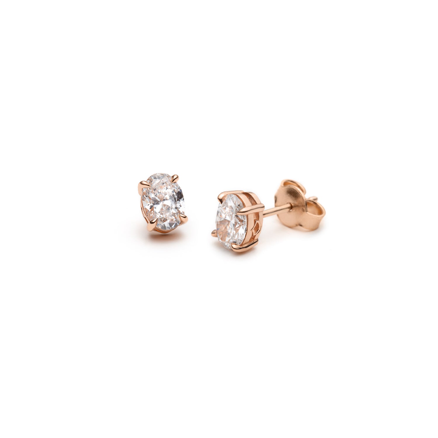 Oval-Shaped Diamond Four-Prong Basket Stud Earrings in Rose Gold