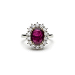 Oval-Shaped Ruby and Round Brilliant Cut Diamond Cluster Ring