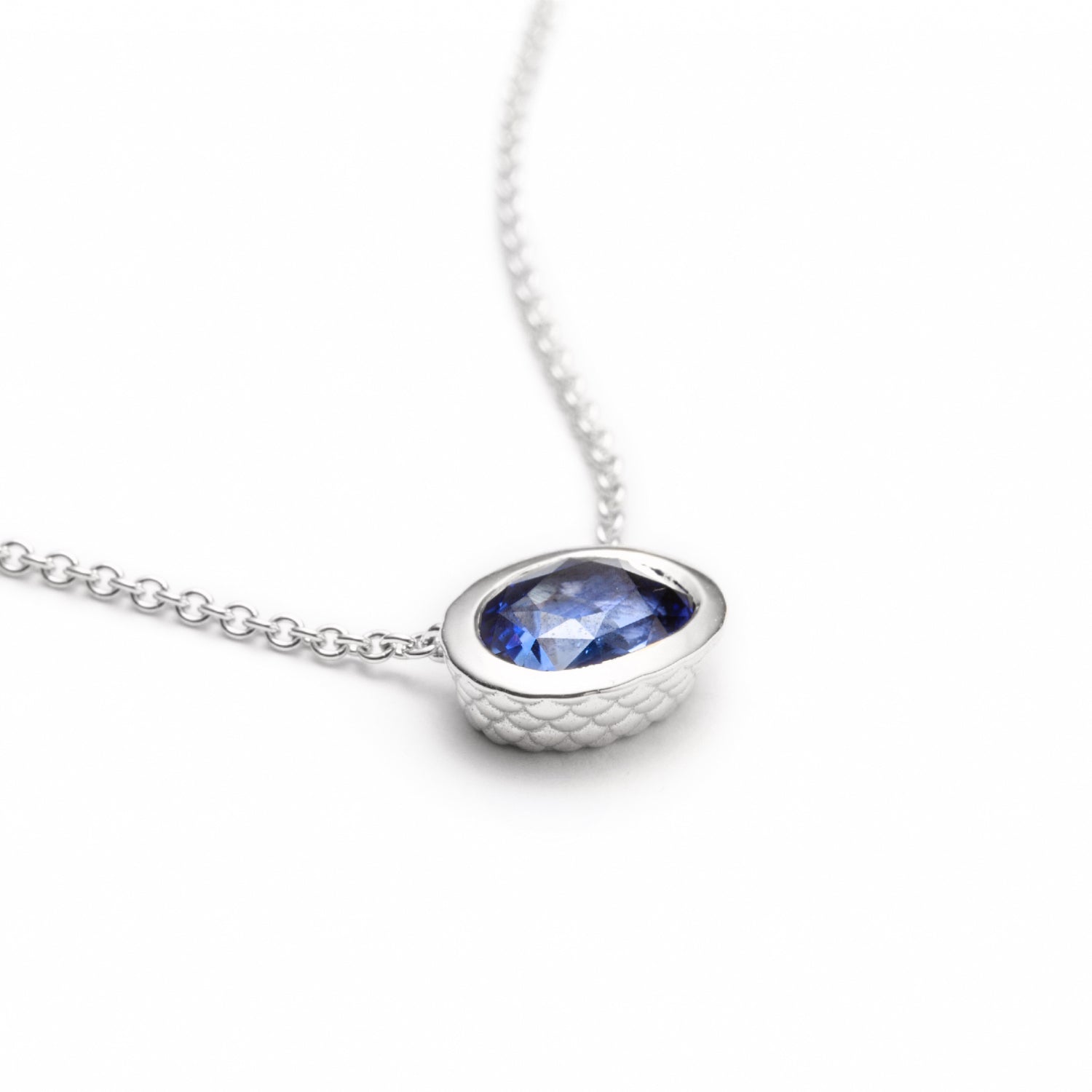 Oval-Shaped Sapphire Bezel Necklace in White Gold Side View