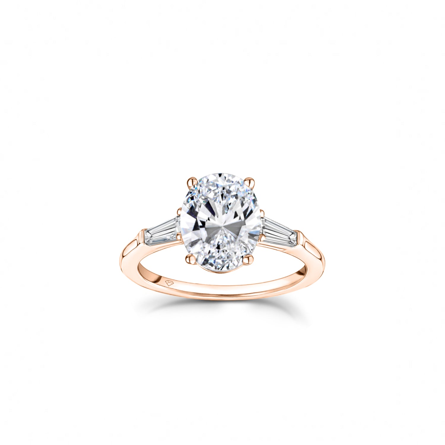 Oval and Baguette Cut Diamond Three-Stone Engagement Ring in Rose Gold
