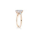 Oval and Baguette Cut Diamond Three-Stone Engagement Ring in Rose Gold Side View