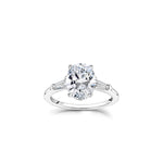 Oval and Baguette Cut Diamond Three-Stone Engagement Ring in White Gold