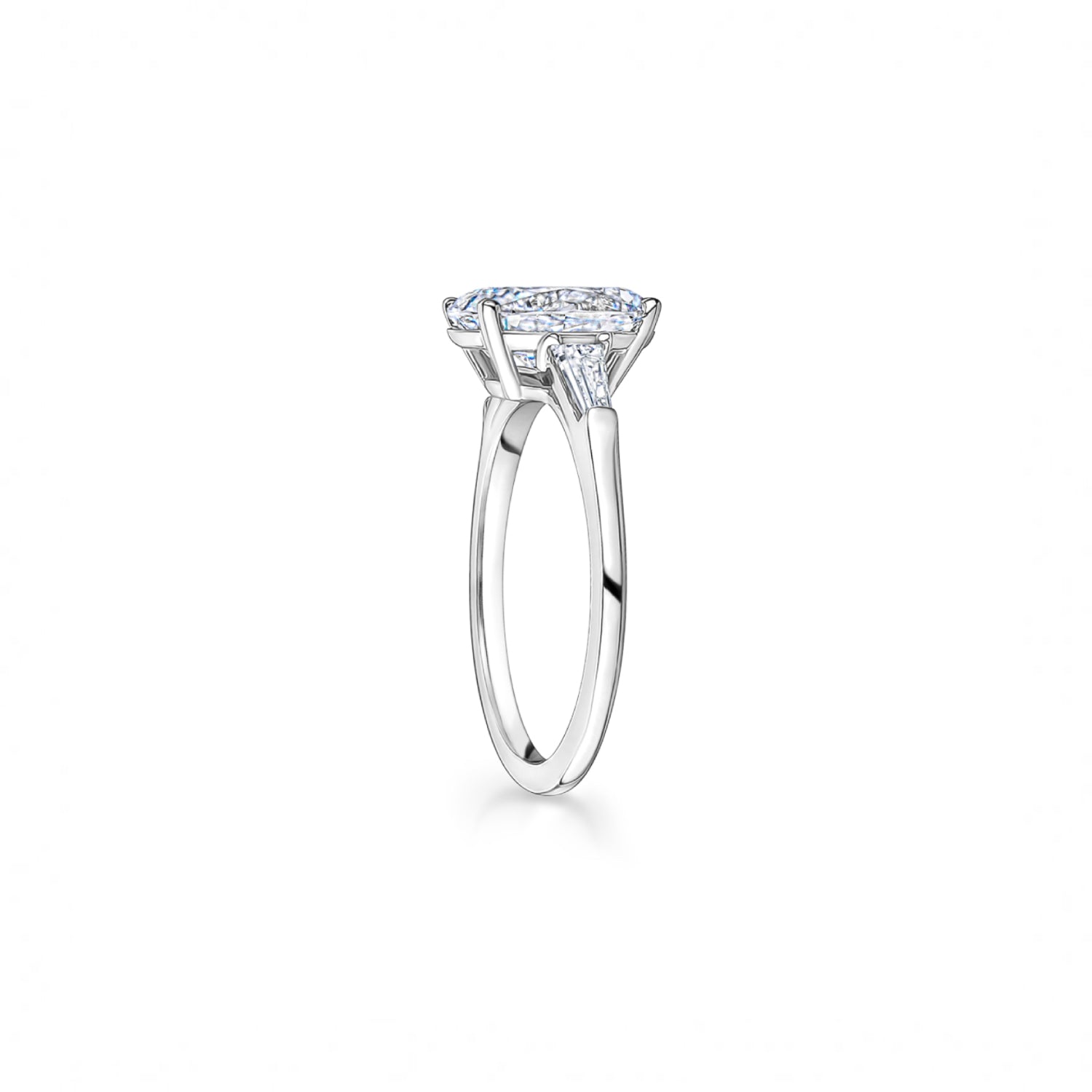 Oval and Baguette Cut Diamond Three-Stone Engagement Ring in White Gold Side View