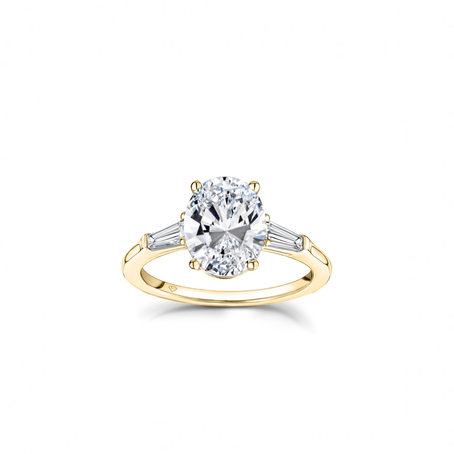 Oval and Baguette Cut Diamond Three-Stone Engagement Ring in Yellow Gold