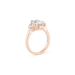 Oval and Heart-Shaped Diamond Three-Stone Engagement Ring in Rose Gold Side View
