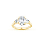 Oval and Heart-Shaped Diamond Three-Stone Engagement Ring in Yellow Gold