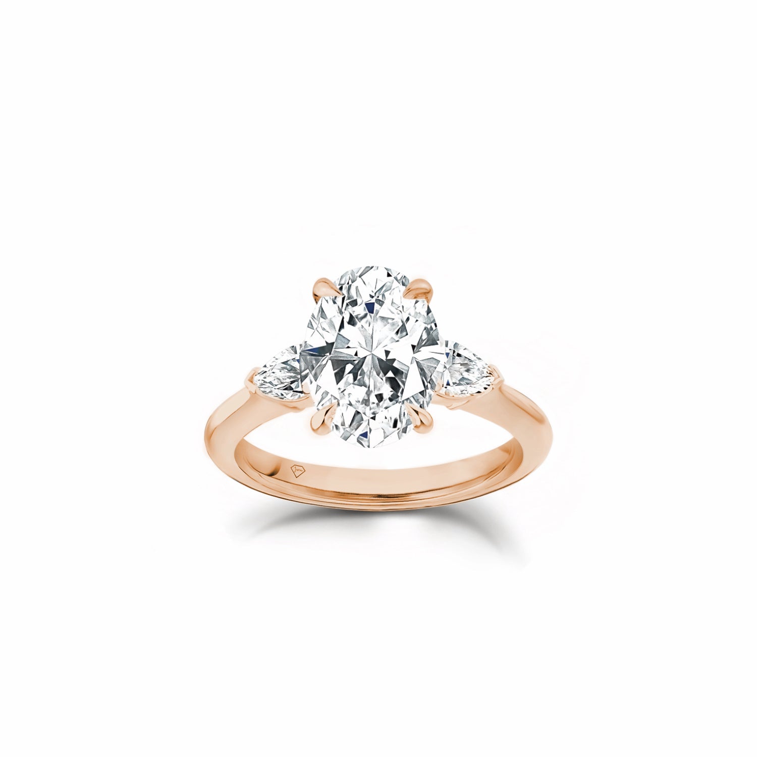 Oval and Pear Cut Lab-Grown Diamond Three-Stone Engagement Ring in Rose Gold Front View