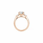 Oval and Pear Cut Lab-Grown Diamond Three-Stone Engagement Ring in Rose Gold Side View