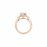 Oval and Pear Cut Lab-Grown Diamond Three-Stone Engagement Ring in Rose Gold Side View