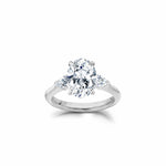 Oval and Pear Cut Lab-Grown Diamond Three-Stone Engagement Ring in White Gold Front View